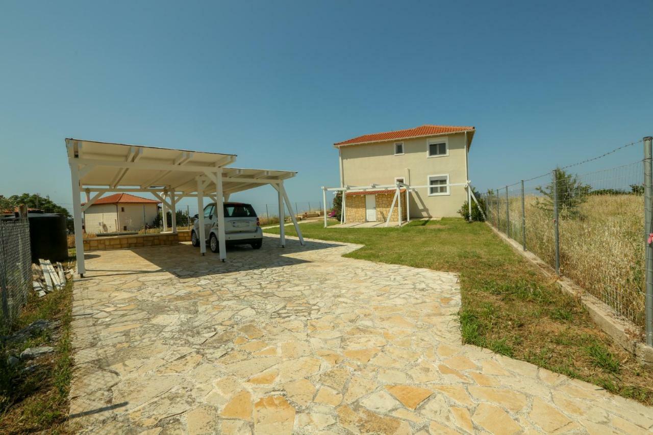 Magnificent Seascape Villa On A Secluded Beach ネア・ムダニア エクステリア 写真
